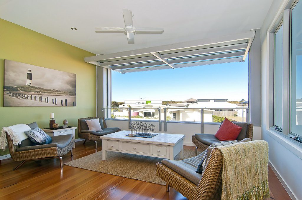 kula beach shack entertainment room on second level with open tilt window