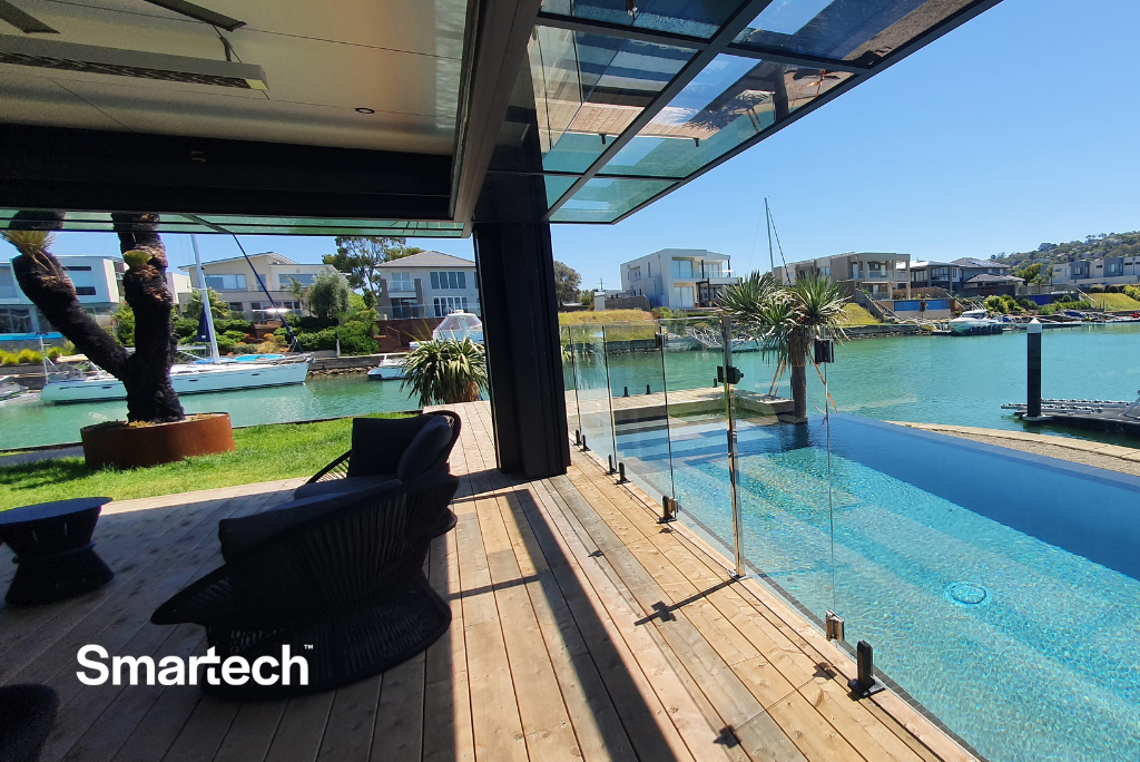 A beautiful sunny day overlooking the marina from the dining room with the folding doors open