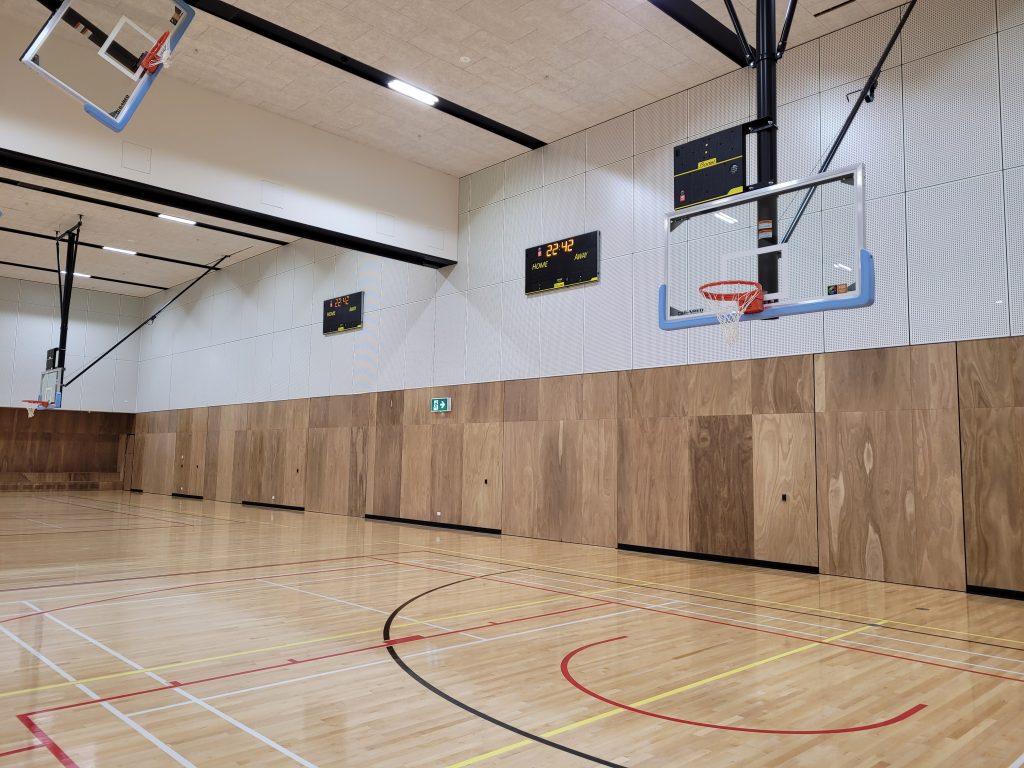 school gym closed all their tilt doors, packing up for the day